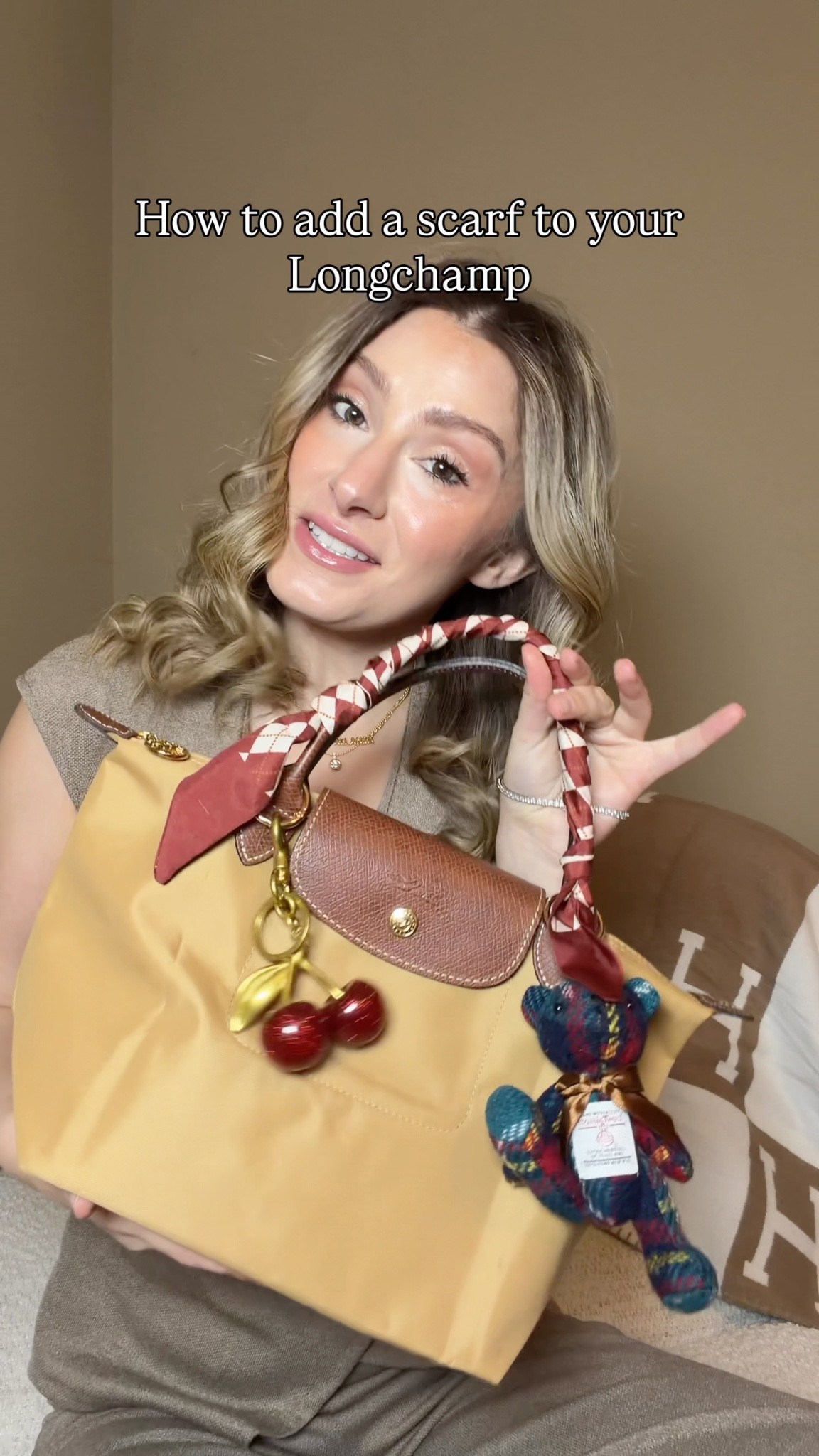 I got some questions on instagram stories about where I got this scarf and how to tie it. I got this bulk pack of twilly scarves for $26 and I love how many patterns and colors it comes with to go with any bag
Cherry glitter bag charm
Longchamp small fawn
Longchamp Le Pliage 
Harris tweed bear bag charm #LTKStyleTip #LTKItBag

#LTKWorkwear