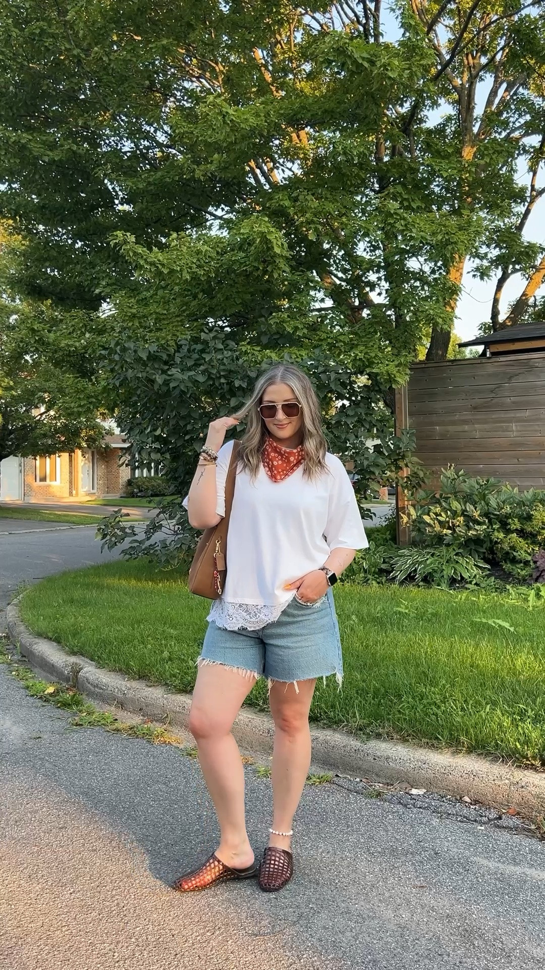 Easy summer outfit! Wearing L in the lace trim tee and sized up to 32 in the denim shorts for a loose fit. I’m a 9.5-10 shoe and wear a 10 in the jelly shoes. Canadian tee & shoes links are under “similar products”. Also linked similar bandanas!

#LTKsummer #LTKmidsize #LTKsale
