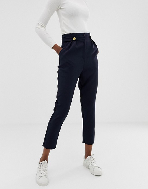 ASOS DESIGN tapered trousers with pleat and military buttons | ASOS UK