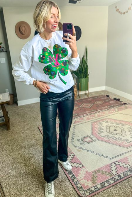 A pop of color for spring with this designer inspired graphic sweatshirt from #ByJodiPedri #ByjodiParlner
☘️ 

I sized up to a medium for an oversized fit. I love how cozy + chic this looks paired w/ faux leather pants + sneakers 

#LTKunder100 #LTKstyletip #LTKFind