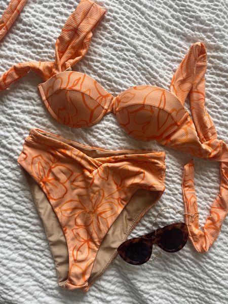  swimsuit of the day☀️🌴 this suit is so flattering with the v at the front and wide straps. I have a small top and small bottoms. 

Swimsuit | highwaisted swim | orange swimsuit | revolve 




#LTKswim #LTKSeasonal #LTKstyletip