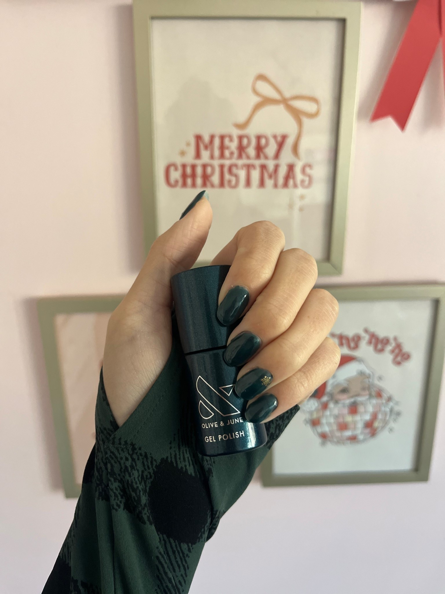 New gel mani for december! Loving this shimmery green gel polish from Olive and June and added some of their nail stickers to add fun and easy nail art to my mani! Olive and June sale ends this weekend!!! Don’t miss out on these amazing sales!

#LTKGiftGuide #LTKCyberWeek #LTKHoliday