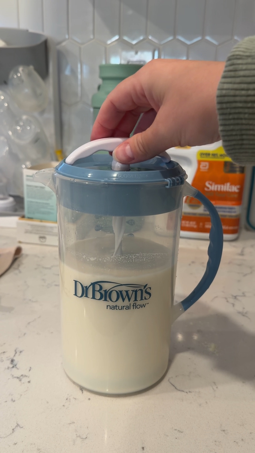 Dr. Brown’s Formula Mixing Pitcher has been such a helpful little upgrade for us. We’ve been making formula in batches and this makes it so much easier - it mixes everything smoothly without a ton of air bubbles, so it’s not all foamy. It’s also super easy to pour, quick to clean, and honestly way cheaper than I expected for how much we use it.

Dr. Brown’s formula pitcher, Dr. Brown’s formula mixer, formula mixing pitcher, formula pitcher, formula batch prep, how to make formula in bulk, formula prep, baby formula, formula feeding, combo feeding, new mom essentials, newborn essentials, baby feeding essentials, bottle prep, bottle feeding, baby bottles, feeding routine, postpartum life, first time mom, affordable baby essentials, baby kitchen essentials

#LTKmomlife #LTKBaby