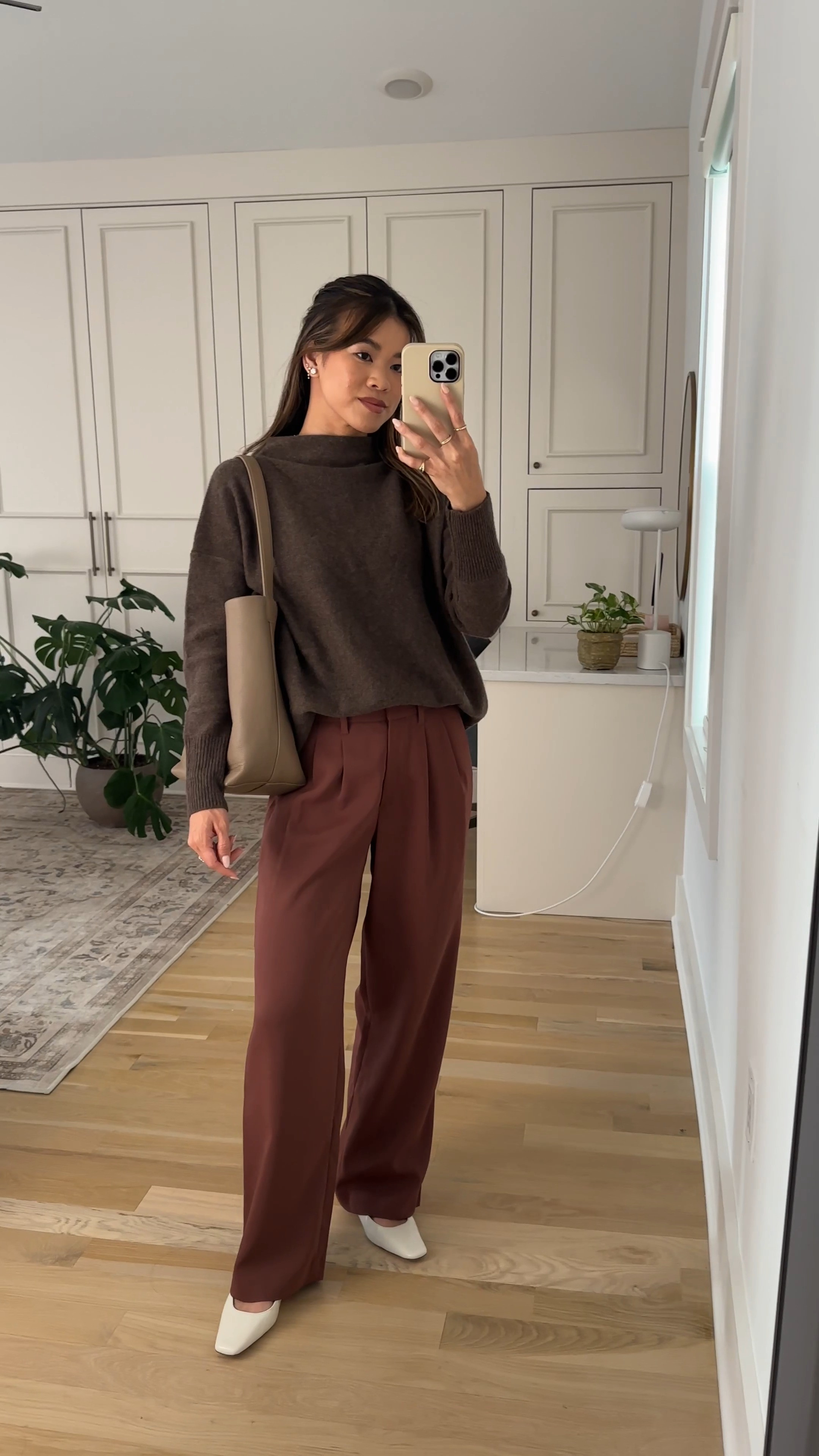 Such a cute sweater from @Quince! Perfect for fall.

Sizing info:
-Quince Mongolian Cashmere Funnel Neck Sweater (Size XS in Brown)
-Quince Stretch Crepe Pleated Wide Leg Pant (Size 0 short)

petite fashion, get dressed with me, outfit inspiration, ootd, nashville outfit, Nashville influencer, petite style, vacation style, casual outfits, mom style, petite pants, fall outfits, fall outfit info, fall pants, fall outfit idea, fall top, fall sweater, fall shoes, quince, summer top, fall sweater, pleated trouser, petite pleated trouser

#LTKootd #LTKSeasonal #LTKPetite