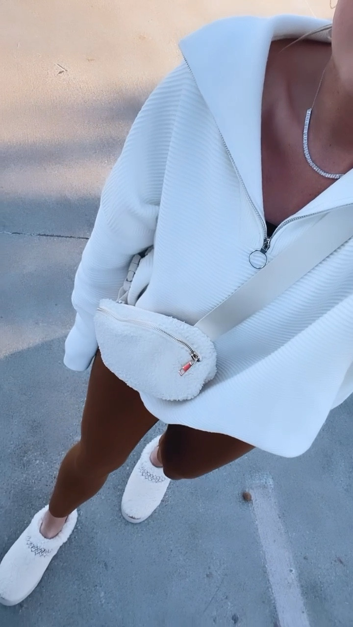 Sized up to a large in sweater. Leggings fits TT, wearing 8. Ugg tazz. Looks for less. 
 #LTKVIDEO. Winter fashion outfit. travel outfit. Lululemon sale. Daily deal. Sale. Fitness. Workout outfit. .Loungewear. Lounge set 


Follow my shop @thesuestylefile on the @shop.LTK app to shop this post and get my exclusive app-only content!

#liketkit 
@shop.ltk
https://liketk.it/4s3yO

#LTKfitness #LTKmidsize #LTKover40 #LTKfamily