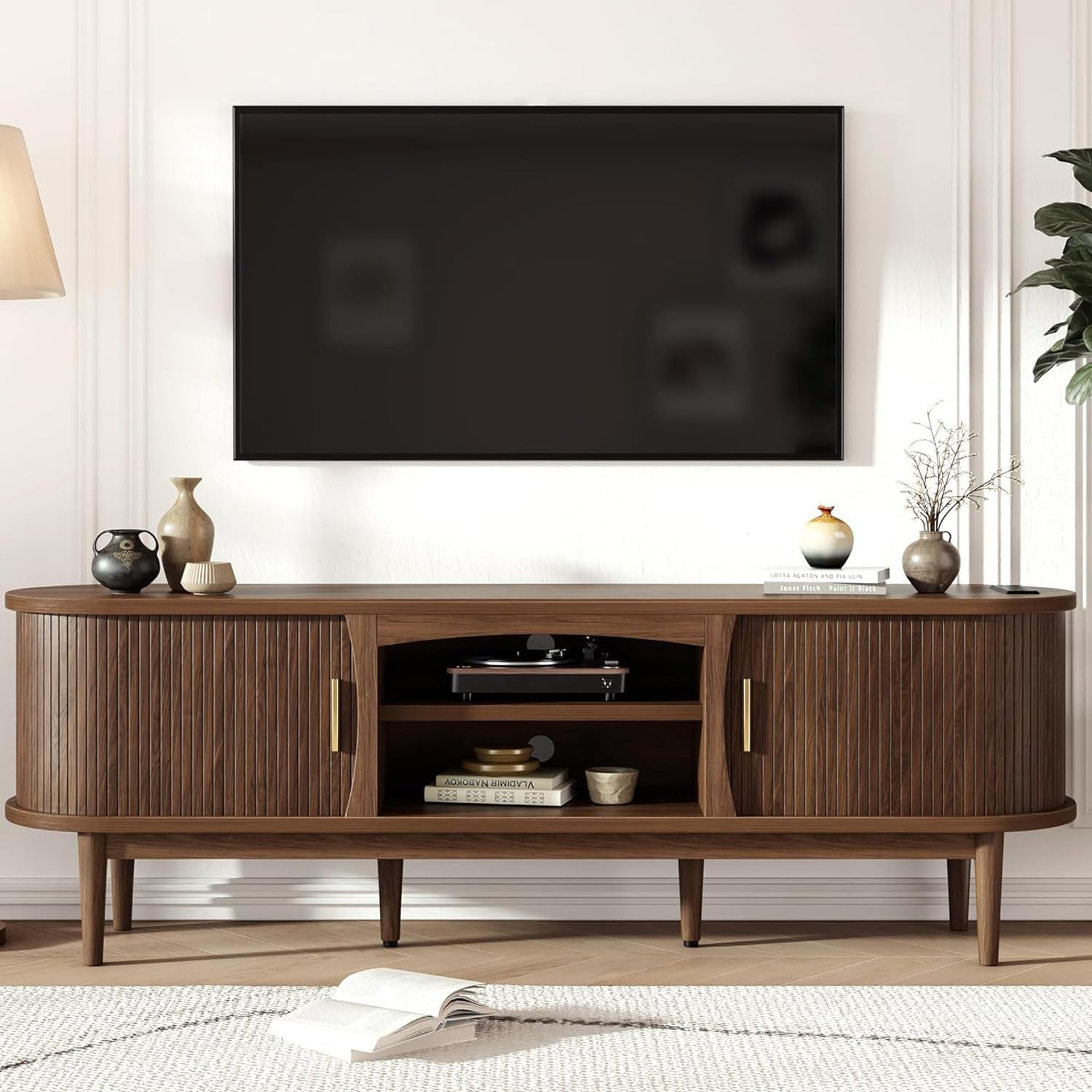 Decofy Mid Century TV Stand for TVs up to 65 Inches, Entertainment Center with Storage, Power Outlet, Fluted Sliding Doors & Adjustable Shelves, Modern Media TV Console Table for Living Room (Walnut) | Amazon (US)