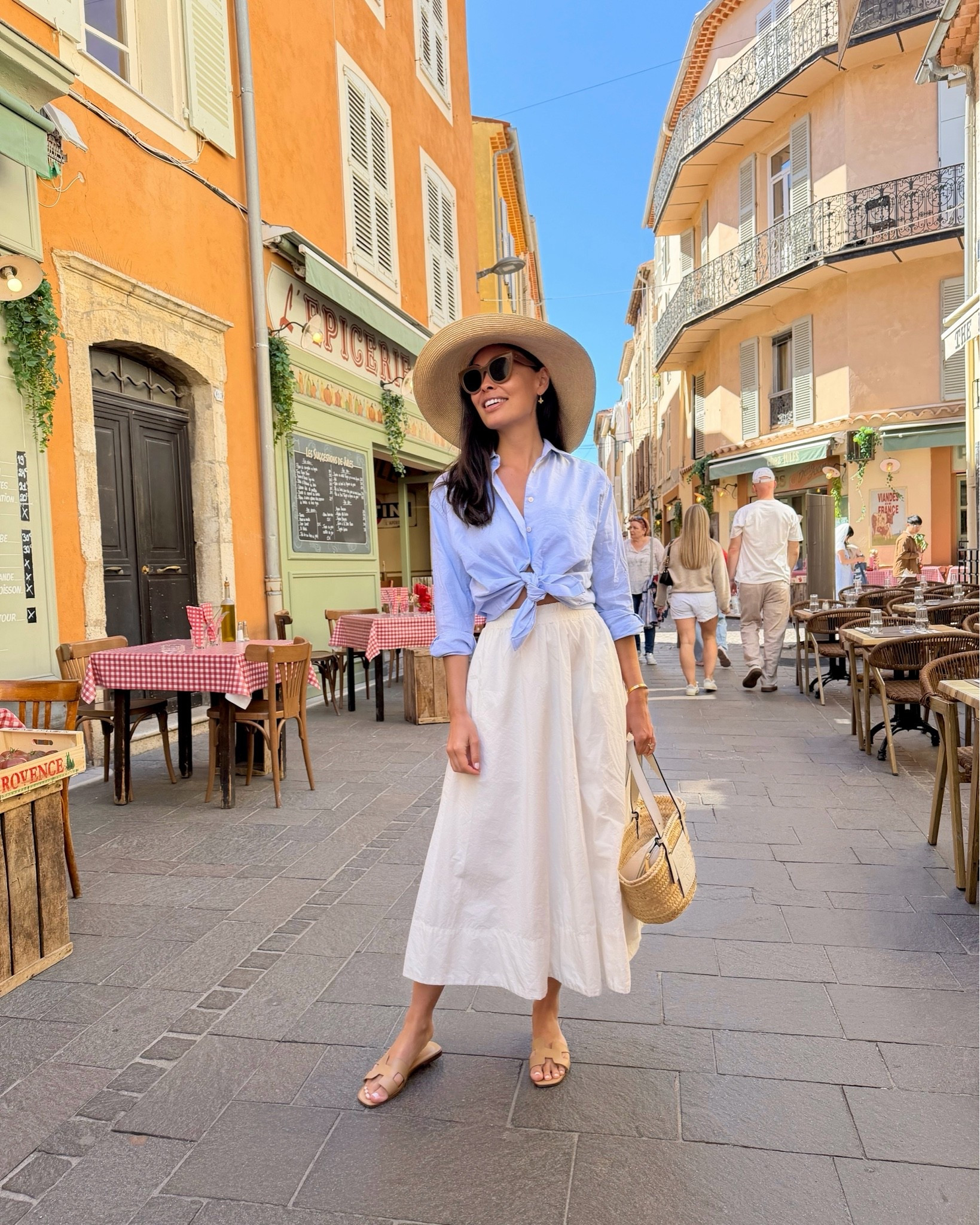 South of France outfit, white skirt, blue button down shirt.

#LTKootd #LTKdayinmylife #LTKSeasonal