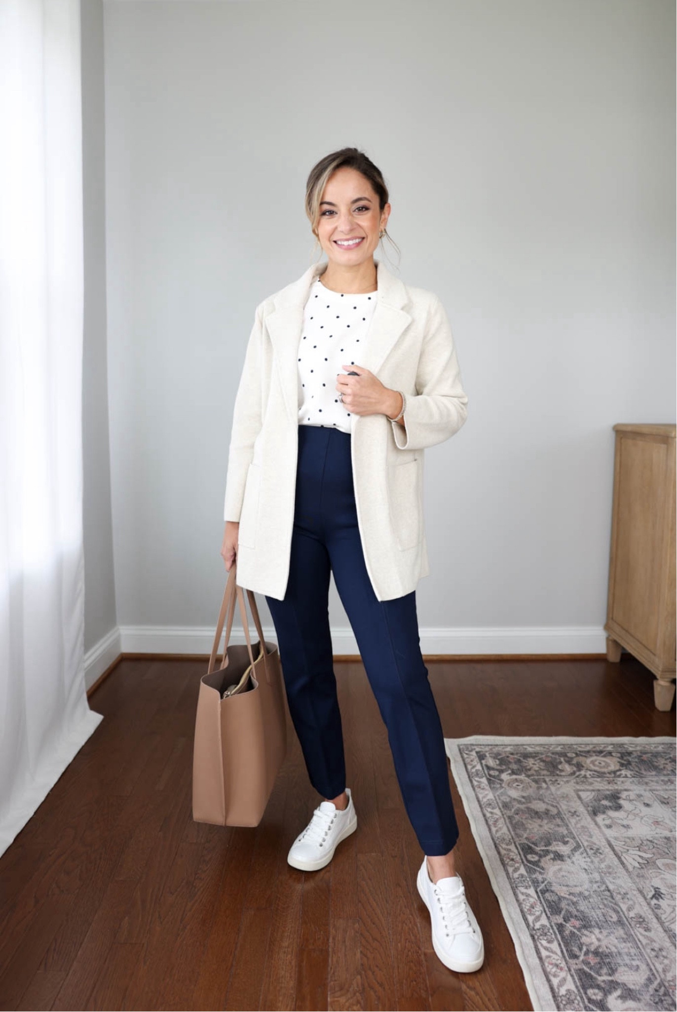 Outfits for teachers series: outfits with sneakers! 

Sweater blazer (Quince): xs in speckled beige 
Navy dot top (LOFT): petite xxs 

Ponte straight pants (LOFT): petite xxs - 10” rise, 26” inseam leggings level stretch

Vionic sneakers: tts 
Quince tote in black and cappuccino 

My measurements for reference: 4’10” 105lbs bust, waist, hips 32”, 24”, 35” size 5 shoe. 25” inseam measurement to my ankle bone. 

#LTKBacktoSchool #LTKWorkwear