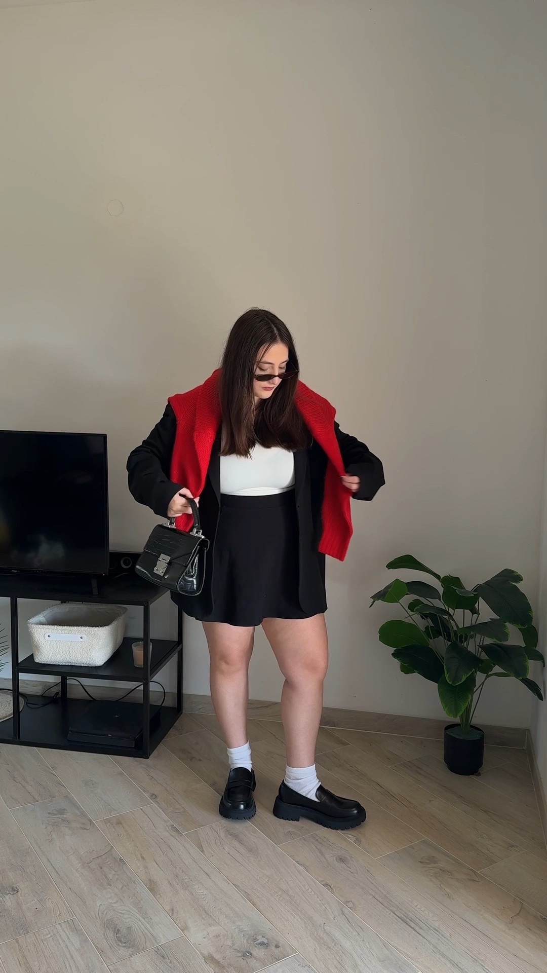 Cozy red sweater with a black blazer and a black skirt 

#LTKeurope #LTKspring #LTKFashionMonth