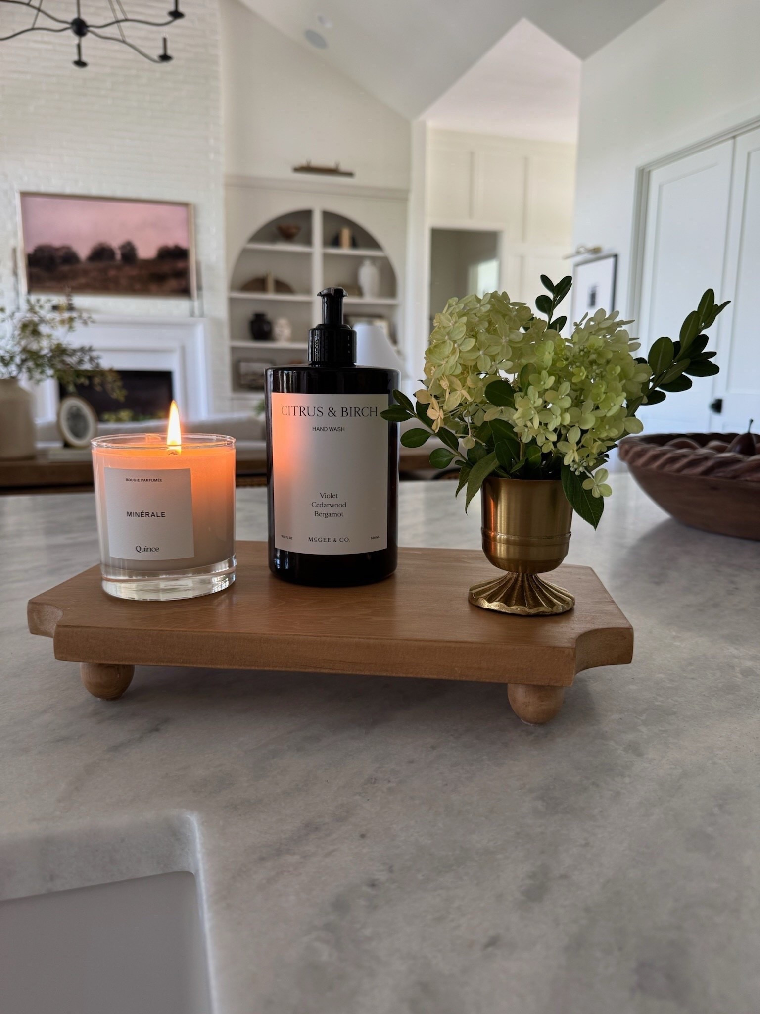 This gorgeous pedestal board is 30% off right now at McGee & Co! I love the shape and the ball feet. The perfect piece to corral all the things—sink station, kitchen cooking essentials, remotes, etc! 

#LTKHome #LTKSaleAlert