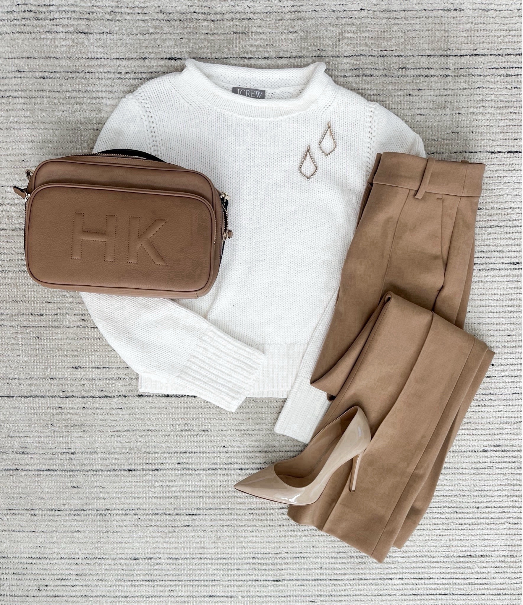 Fall workwear with chunky knit roll neck sweater paired with tan stretchy pants and styled with pumps for a chic look. Absolutely love this outfit. Sweater is on sale for 50% off and pants are 15% off

#LTKStyleTip #LTKCyberWeek #LTKSaleAlert