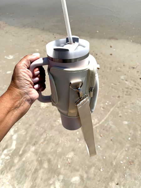 The Stanley Cup carrier was perfect to put my keys phone and where on my shoulder while I carried a bunch of things down to the beach

#LTKFitness #LTKTravel #LTKSwim