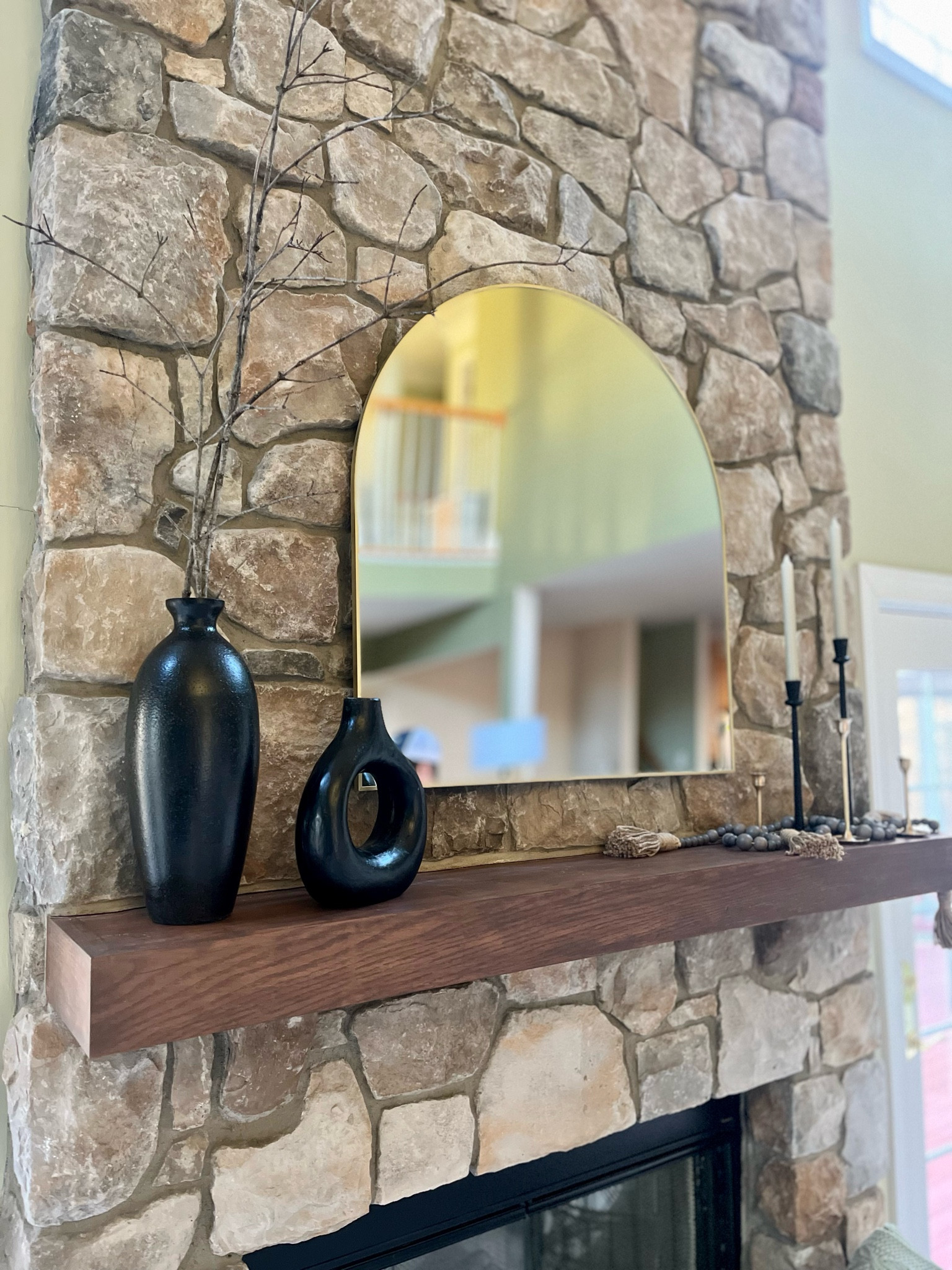 Keeping it simple with my winter mantle decor. 

Black vase, textured vase, faux stick decor, arch mirror, brass mirror, candle sticks, brass candle sticks, wood beads, living room, fireplace, neutral decor, stone fireplace, winter home, Amazon find, finds under 30, home

 

#LTKfindsunder50 #LTKSeasonal #LTKhome