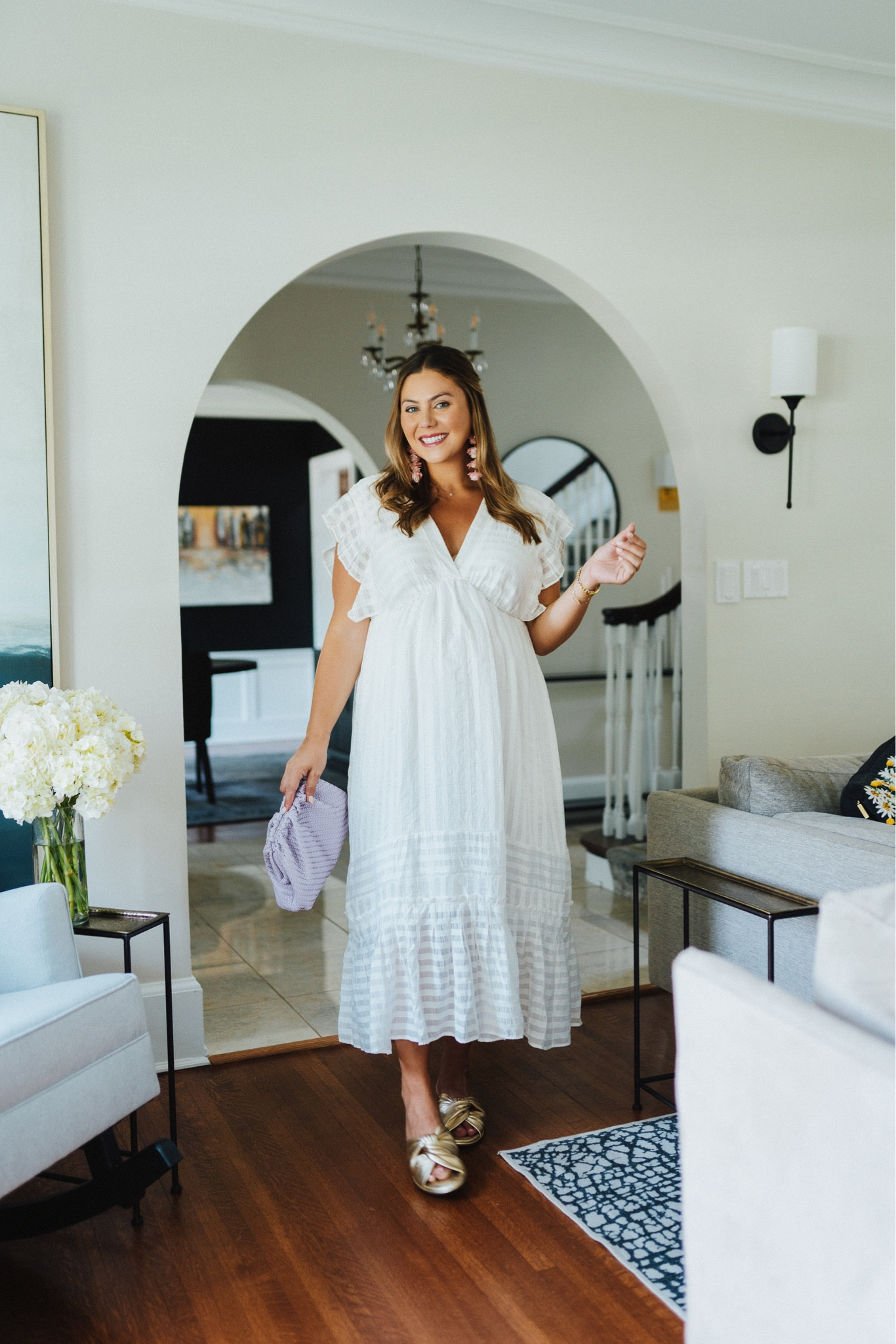 Summer maxi dress, non-maternity but bump-friendly, wearing size XL. Love this white dress for the summer. Adding a pop of color with a bag and sandals! 

#LTKshoecrush #LTKSeasonal #LTKcurves