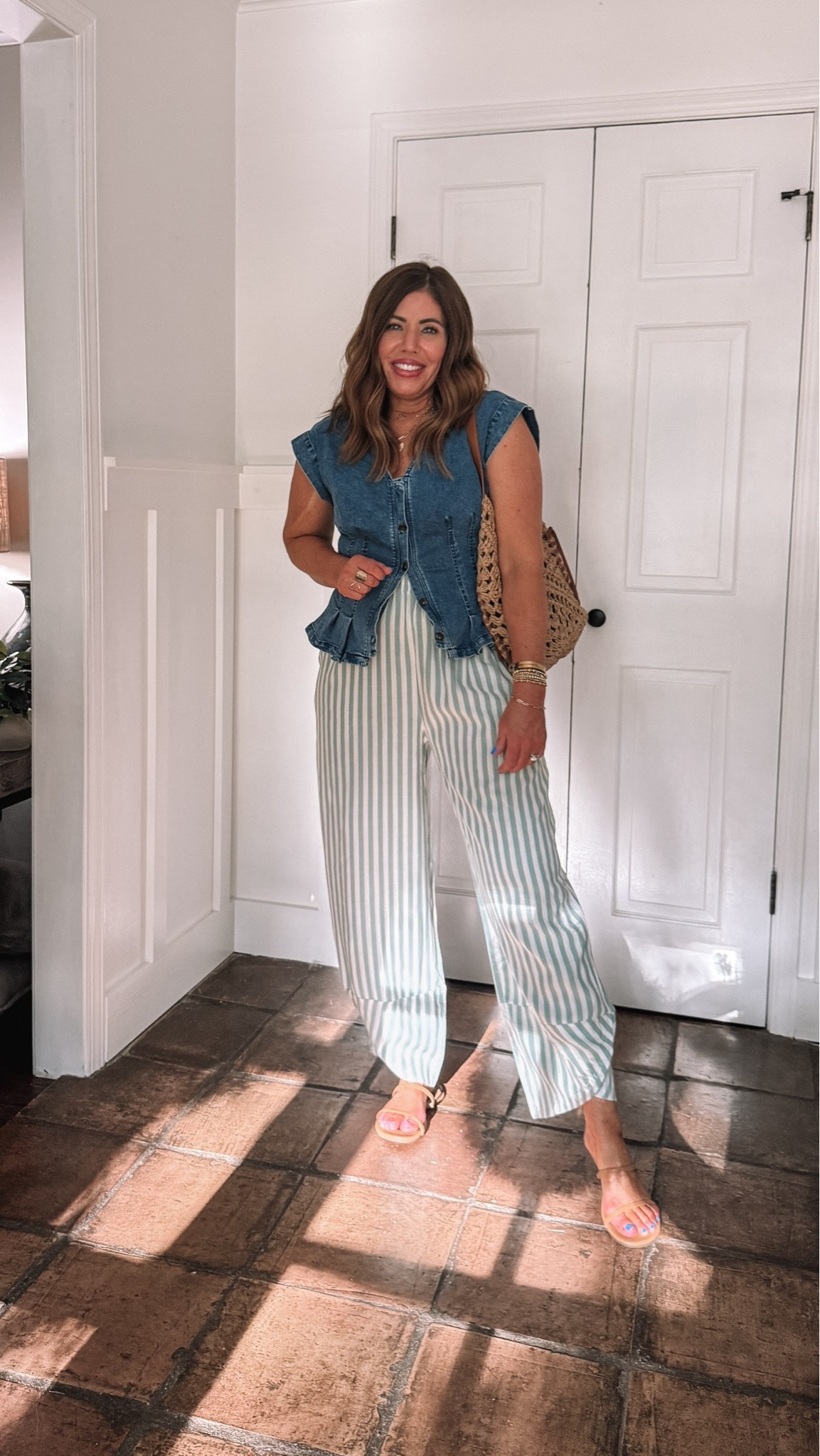 Super cute elevated casual outfit for summer! This would be perfect to wear to a business, casual office and more!

These pants are a tencel/ rayon blend. I sized up to a large for more room in the hips.

Denim vest is a free people look for less. It’s great quality and will elevate any pair of pants and more. I’m wearing a large it has stretch and so comfy!

Sandals are a look for less they’re true to size and so comfy

This bag is one of my new favorites for summer! It’s the perfect everyday size. I love it.

#LTKOver40 #LTKootd #LTKSaleAlert