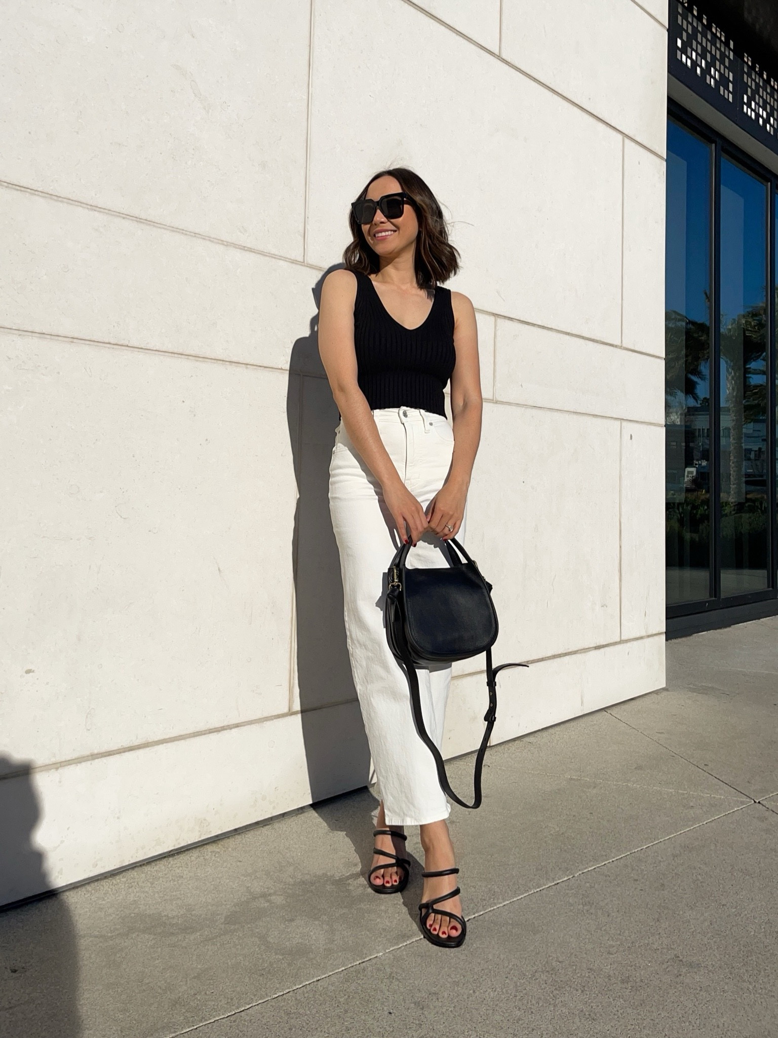 B&W spring outfit 🖤

Tank - linked similar 
Wide leg crop jeans - linked similar 
Block sandals - linked similar 

#LTKstyletip #LTKSeasonal