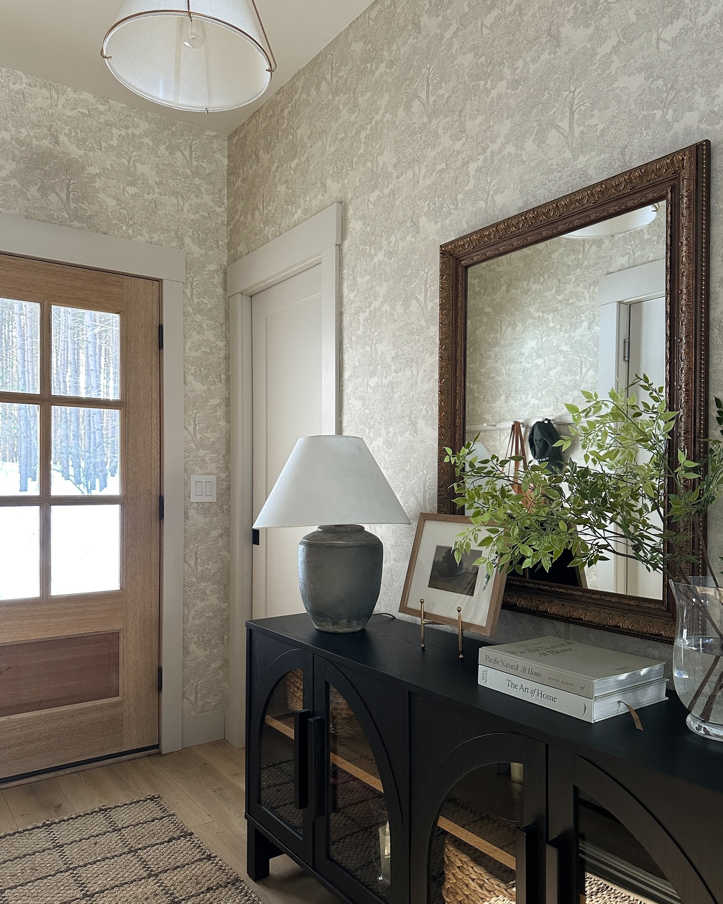 Welcome to our home 🤎 This space feels like the perfect balance of pretty and practical, which is exactly what we need in our small home! Scroll to the end to see what it looked like before icymi 🫣

#LTKStyleTip #LTKHome #LTKFindsUnder100