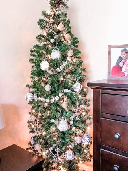 This birch wood garland is a big favorite of mine for my neutral bedroom tree

#christmastree #christmasdecor #garland #bedroomtree 

#LTKhome #LTKHoliday #LTKsalealert