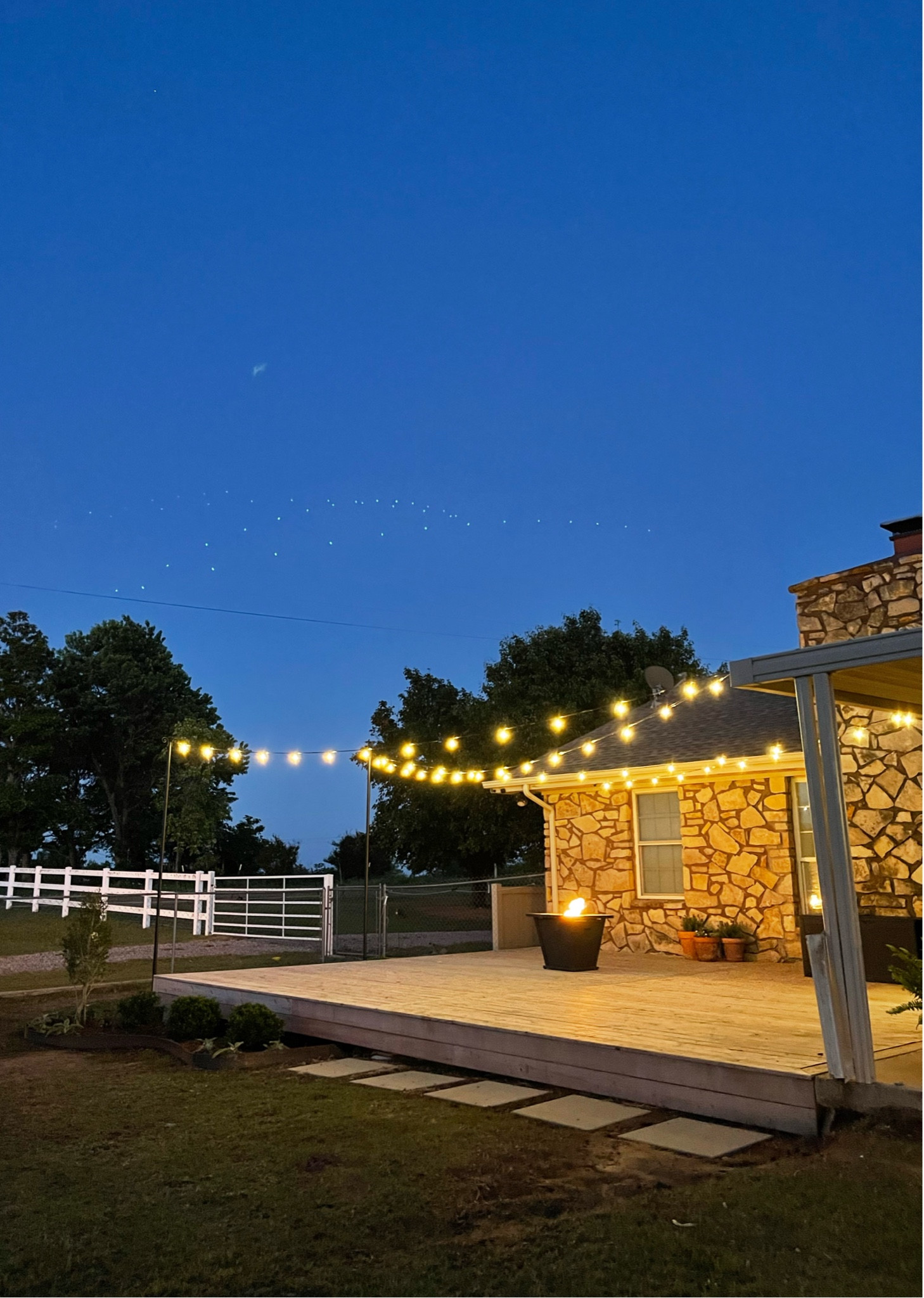 DIY backyard string lights! If summer had a moodboard, this would be on it. 

#LTKHome #LTKSeasonal #LTKmomlife
