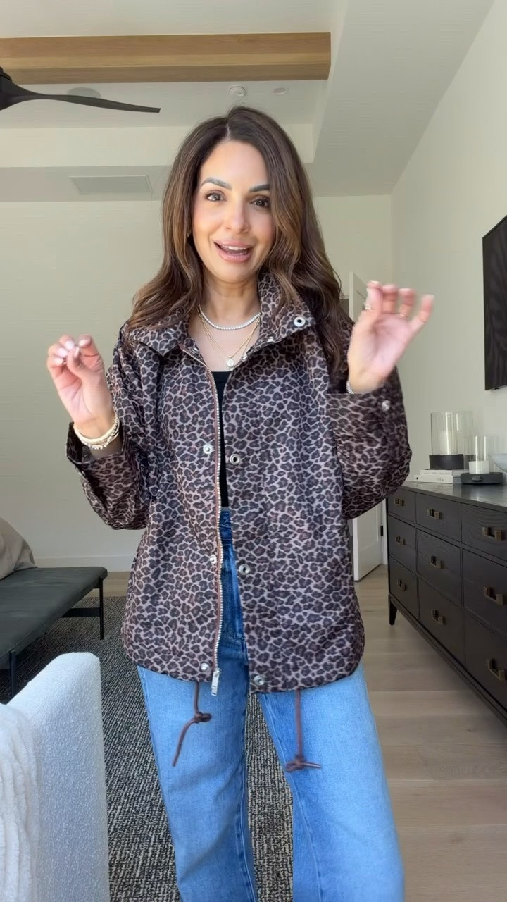 How cute is this leopard print rain jacket from @Anthropologie?! Perfect for over workout clothes and sweats too!