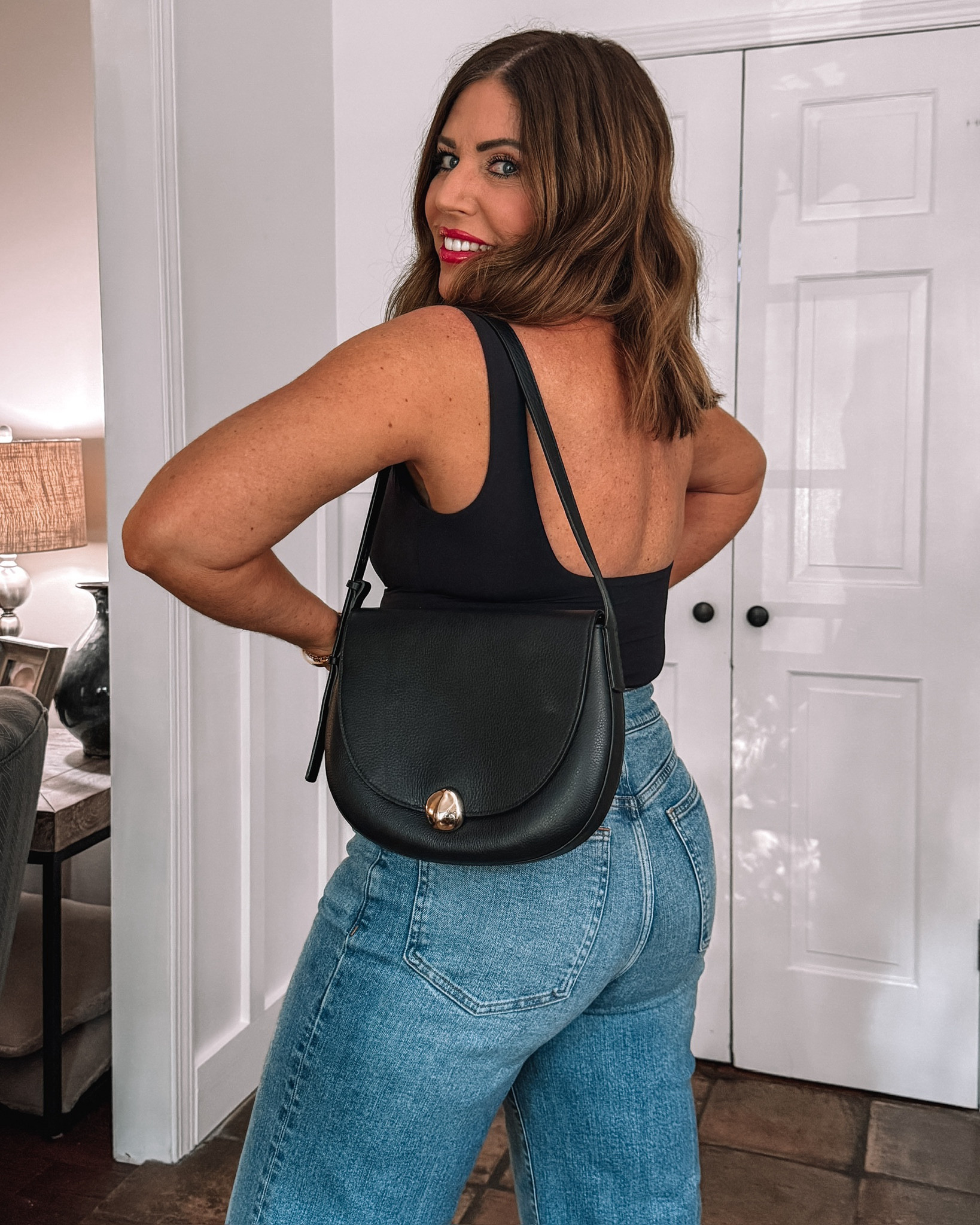 The cutest top padded open back tanks that are perfect for date night, vacation and more! They come in several colors and they are on sale for $19.99. I am wearing my true size medium. You can dress them up or dress them down. They do have removable pads and they are so comfortable and flattering. ￼

#LTKSaleAlert #LTKMidsize #LTKOver40