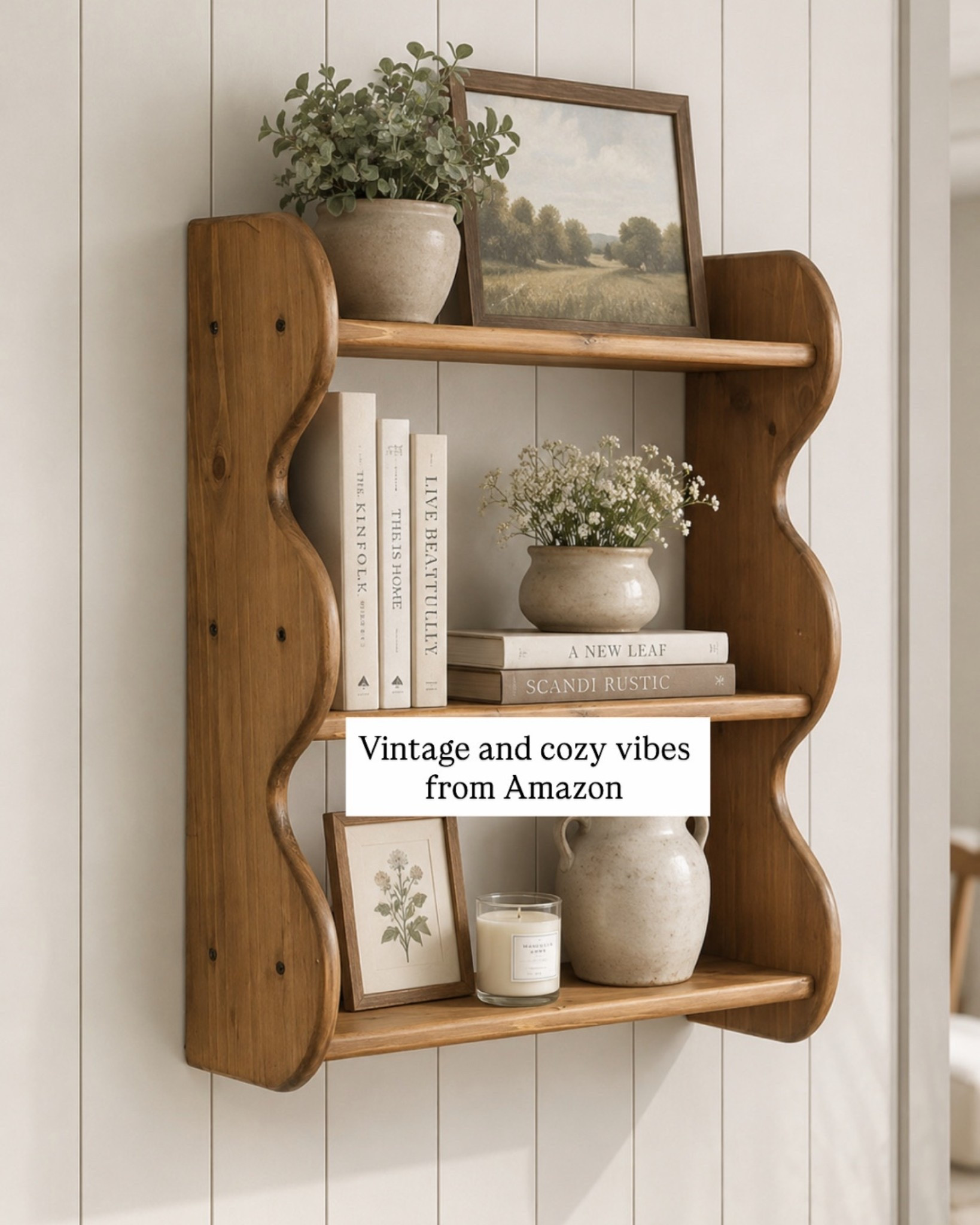 Curvy shelves are such an easy way to add character and warmth to a space 🤎 I love styling this one with neutral books, vintage-inspired pieces, ceramics, and a little greenery for that collected, cozy look.

#LTKSeasonal #LTKHome