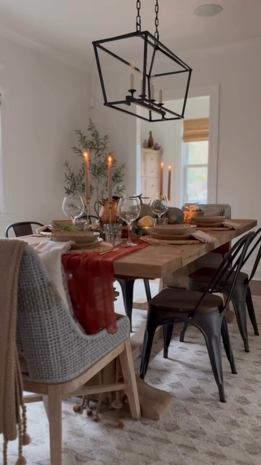 Thanksgiving 🦃 table inspo sans the Christmas flare ⬇️

For a layered look, here is my formula:
1. Start with a runner or table cloth to ground the space 
2. Add texture - I love using woven charger plates or serving baskets/trays for this
3. Put out your favorite dinnerware set 🍽️ 
4. Add something organic — think flowers or greenery… I used eucalyptus garland here 🌿
5. Candles are a MUST! Sets the tone & adds warmth🕯️
6. Add decor — pumpkins & vintage collected items make the perfect pair 
7. Use your fancy wine glasses! They always make a statement and compete the table 🍷

Thanksgiving Table | Tablescape | Dining Room | How To | Set the Table | Autumn Focused Thanksgiving | November Vibes