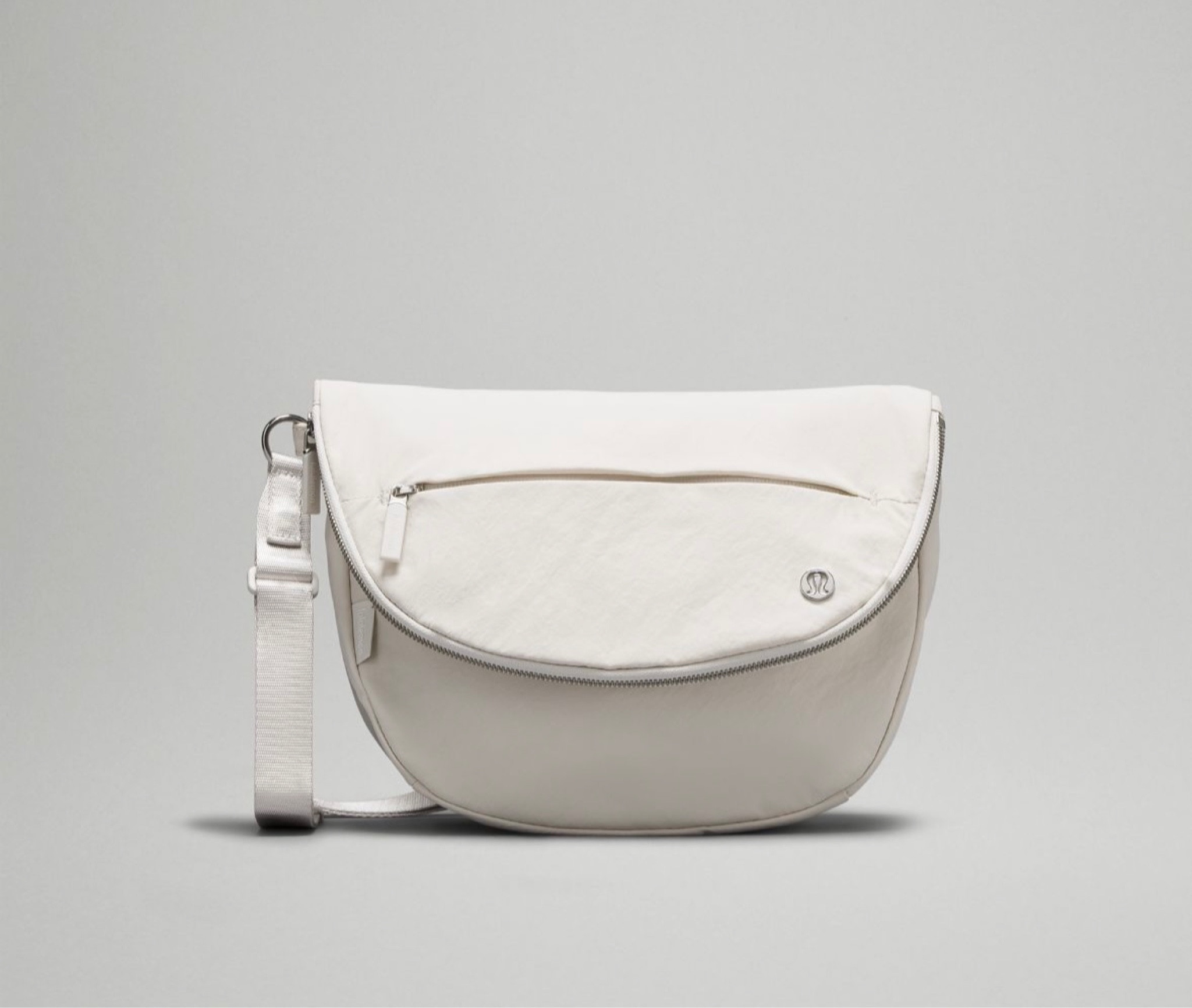 Lululemon festival crossbody bag white cream beige color, black and gold, Lulu accessories, belt bag, fanny pack, Lululemon dupe, athletic bag, winter bag, skiing bag, hiking bag, black purse, white purse, beige purse, gift guide, gifts for her, hiking accessories, travel must haves, travel needs, travel finds, lululemon sale finds, girl gifts, winter fashion, gym pouch, cute purse, trendy purse, designer bag#LTKunder100

#LTKtravel #LTKGiftGuide #LTKfindsunder100