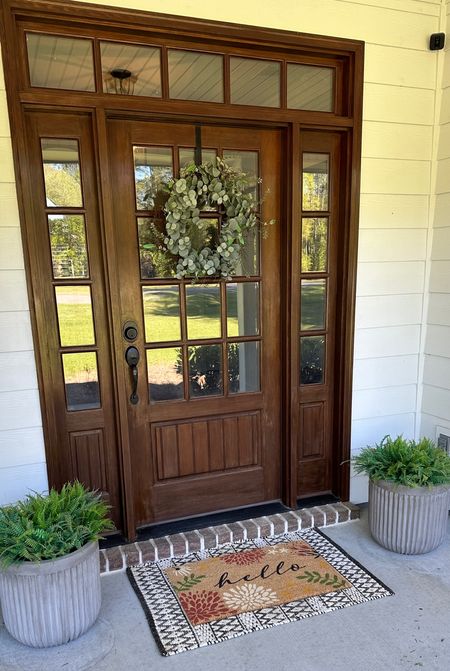 Spring front door with faux ferns, door mat and wreath 

#LTKSeasonal #LTKhome #LTKsalealert