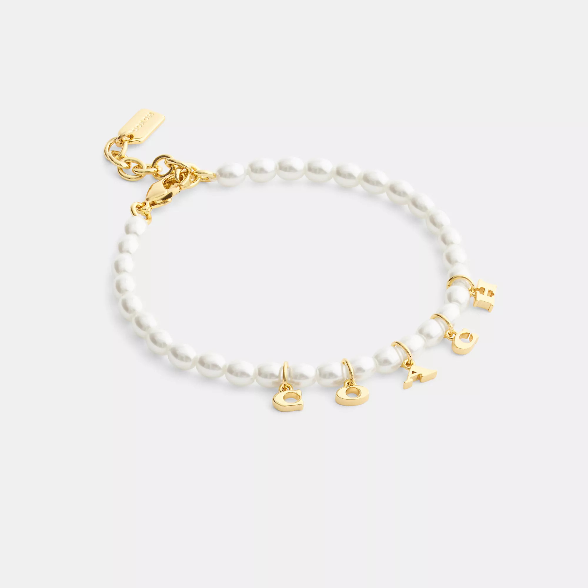 Coach Outlet Coach Charms Pearl Bracelet | Shop Simon