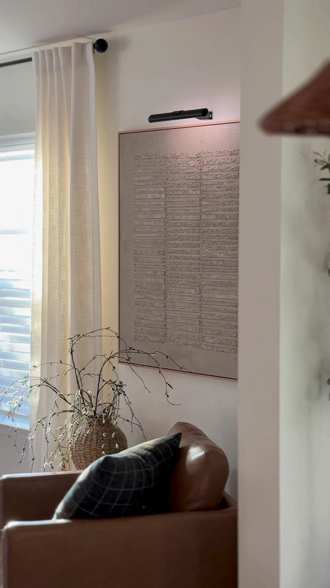 Organic modern living room corner refresh!
Leather swivel chair, minimal willow stems, woven vase, organic modern art, picture light, earthy decor, organic modern art

#LTKHome #LTKWatchNow #LTKMostLoved