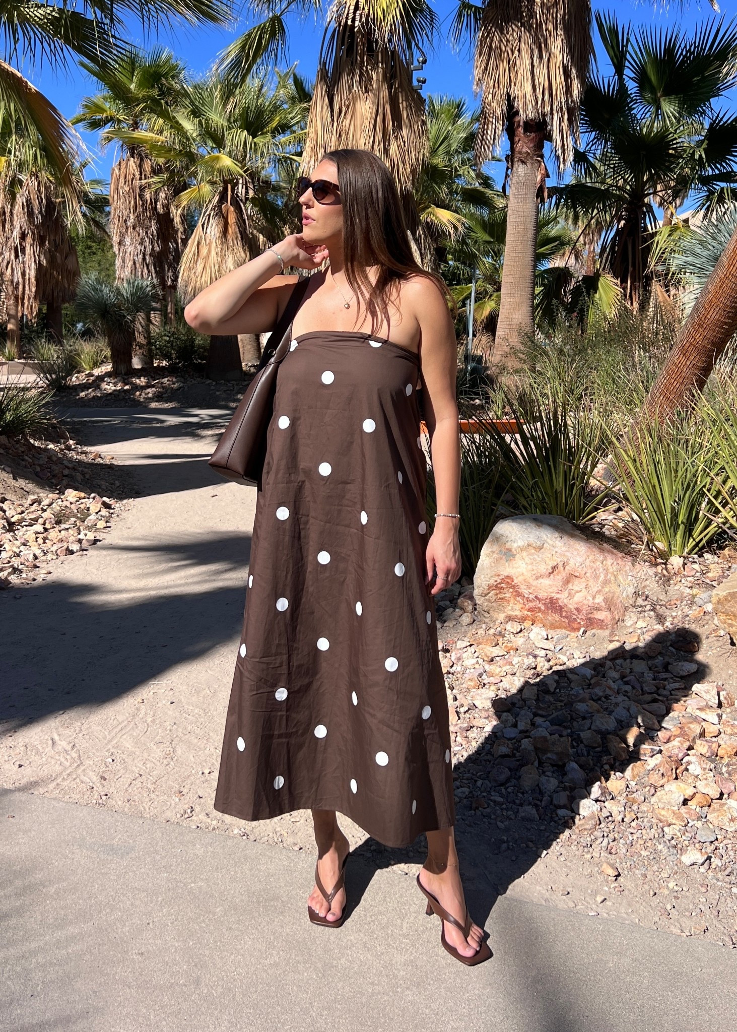 Easy, breezy, and effortlessly chic 🤎 This strapless polka dot midi dress is the kind of piece that works for vacation days, warm-weather dinners, and everything in between. Lightweight, flattering, and comfortable without feeling too casual — styled with simple sandals and a shoulder bag for an easy, pulled-together look. Such a great option for travel or everyday summer style.

⸻

Keywords:

polka dot dress, strapless midi dress, brown midi dress, summer vacation outfit, resort wear outfit, warm weather dress, vacation dress, neutral summer outfit, effortless summer style, minimal summer outfit, sleeveless summer dress, easy summer outfit, women’s midi dress, travel outfit ideas

#LTKootd #LTKFindsUnder100 #LTKTravel