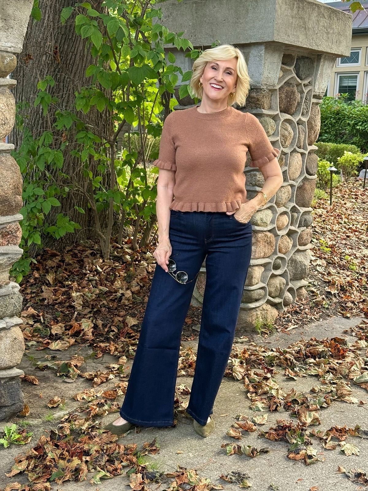 Camel and dark denim feels effortlessly chic. 🤎

I love how this ruffle-sleeve sweater adds a feminine little detail to an otherwise classic outfit. Paired with dark-wash jeans and ballet flats, it’s comfortable enough for everyday but still feels polished and put together.

This is one of those outfits I’d reach for when I want to look nice without overthinking it — simple pieces, pretty details, and an easy combination that just works.

#LTKOver40 #LTKSeasonal #LTKootd