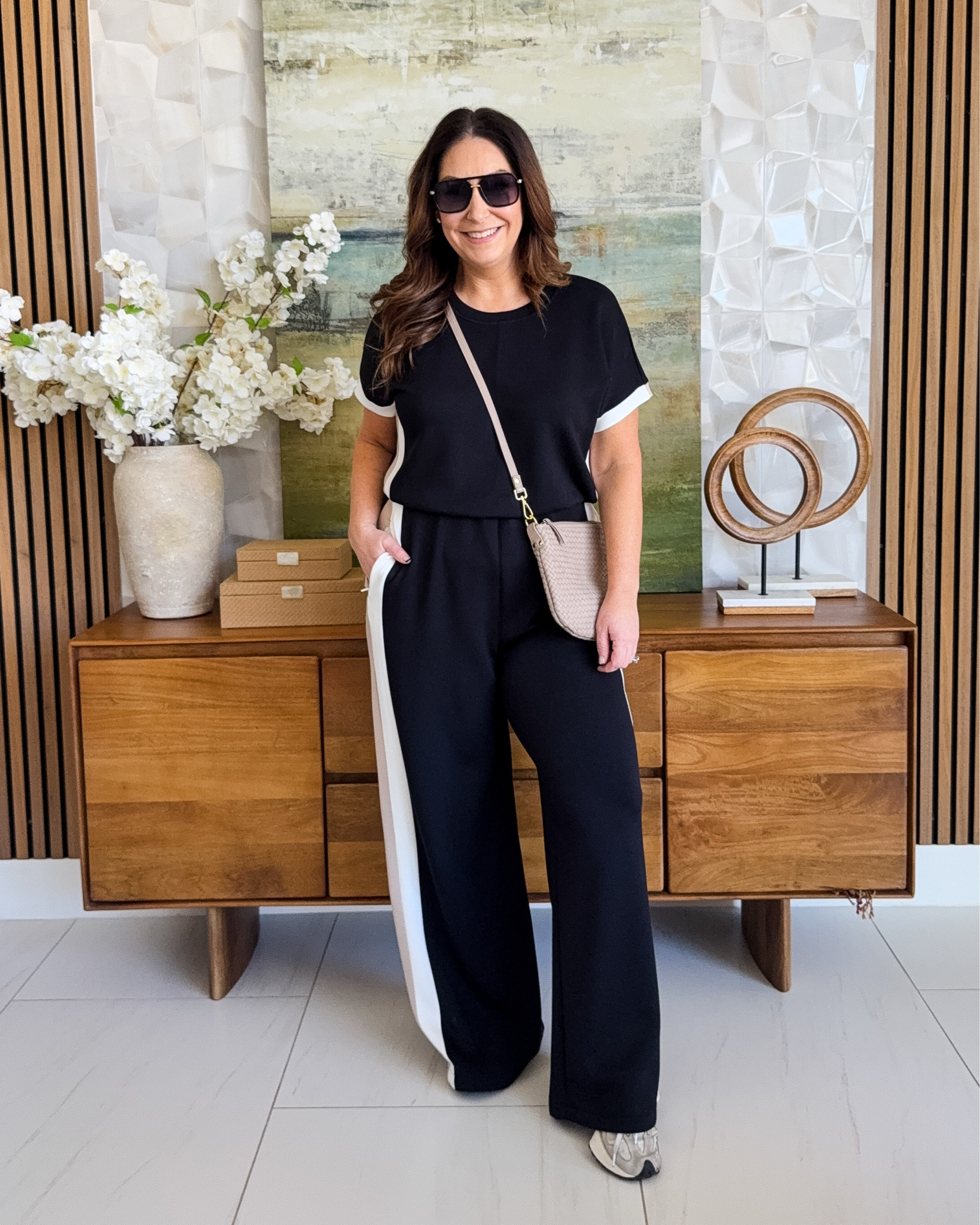 Casual Travel Outfit with colorblock jumpsuit! This has a super soft fabric and button at neck to take on and off. Zip pockets and love the colors. 

Runs true to size - wearing large regular length 

New Customers use code RYANNEXSPANX for 15% off and free shipping

#LTKTravel #LTKSpringSale #LTKMidsize