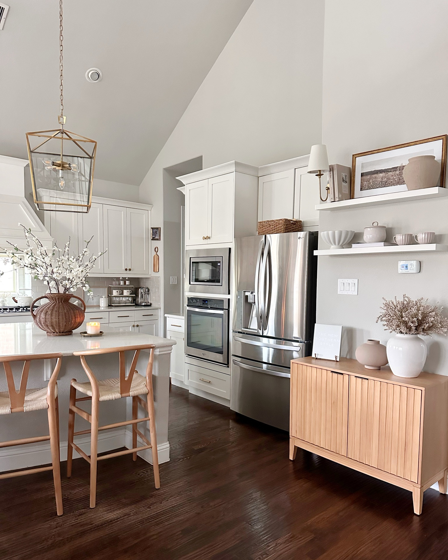 Winter touches in the kitchen ✨ The fluted wood cabinet adds so much warmth, and the floating shelves are all about cozy textures and neutral tones this season. ❄️

#KitchenStyling #CozyWinterDecor #NeutralSpaces

#LTKStyleTip #LTKHome #LTKSeasonal