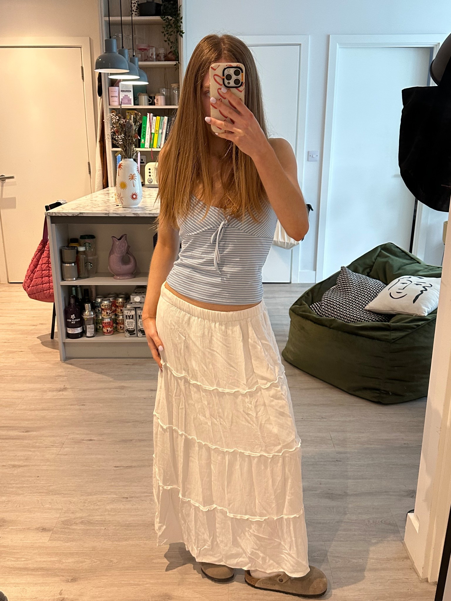 long white maxi skirt and blue strappy top 

#LTKsummer #LTKuk #LTKspring