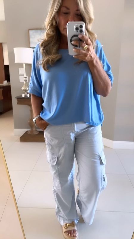Cute and comfy casual outfit. This cargo pants are dreamy! So soft and comfy I even wore them on a plane! 

#LTKTravel #LTKSaleAlert #LTKFindsUnder50