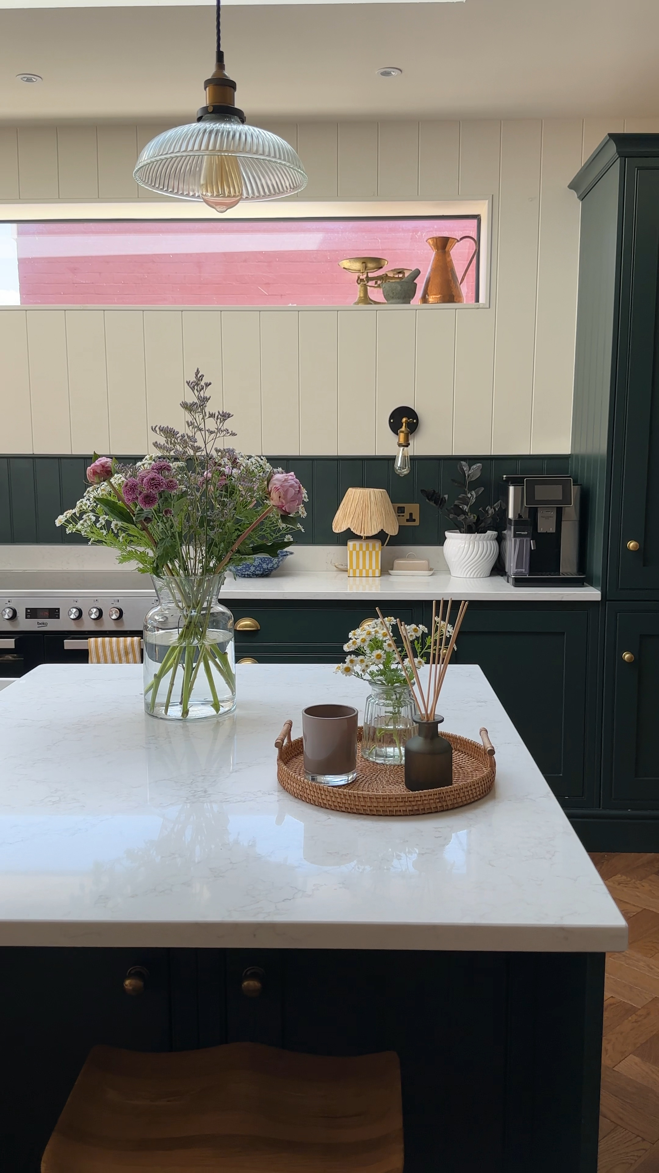 Green devol style family kitchen with white quartz worktops and flowers. 

#LTKhome #LTKeurope