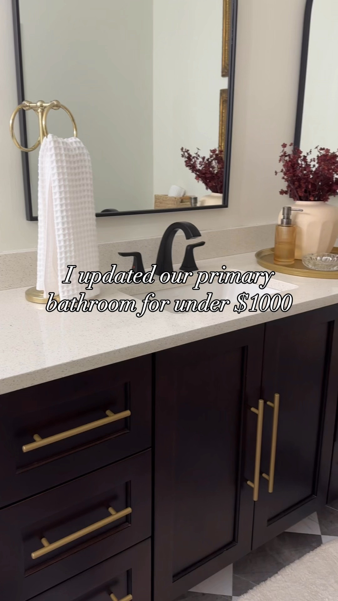 Would you believe me if I told you these floors are peel and stick tile? I HATED our primary bathroom, especially the brown floors 🤢 but didn’t have the budget for a complete remodel. I completely this entire project in about 3 days and the grand total was $975 including mirrors, lighting and all decor. 

✨comment LINK for a DM of all products✨

Floor tiles $200 ($20.99 for a box of 10 tiles): @chrislovesjulia from @wallpops 
Mirrors $120 each:  @arcushomedecor on Amazon 
Lights $150 each: @wayfair 
Decor $135: I went to Goodwill for a majority of my decor and @tjmaxx . I also used what I already had on hand that would match the vibe I was going for 
.
.
.
#home #bathroomremodel
#bathroommakeover #peelandstick #peelandsticktiles #primarybathroom #interiordecorating #renterfriendly #homeinspo #bathroomstyling #guestbathroom #smallbathroom #modernclassicinterior #homedecorideas #bathroomorganization #bathroomdetails #masterbathroom #affordablehomedecor #budgetfriendly  #decoratingonabudget #bathroomideas #bathroomstyle #bathroominspo #diyhomedecor #diybathroom #diyinspiration 

#LTKHome #LTKFamily #LTKxWayfair