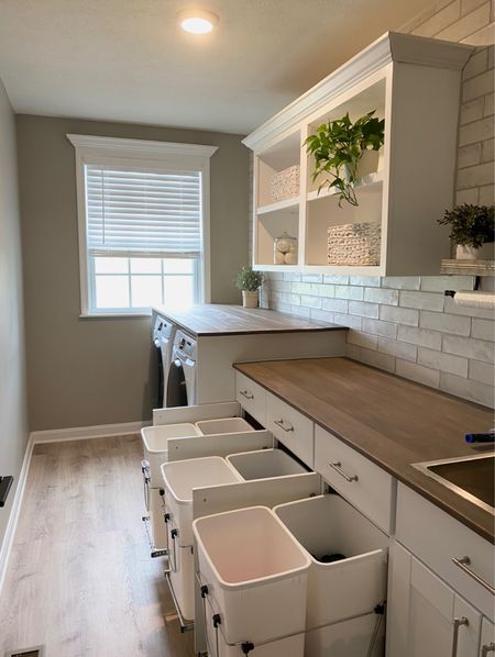 My FAVORITE laundry room addition was the laundry room hampers! I am suuuuuper fussy when it comes to my laundry. Every color has a different bin then spandexy items and cotton items get washed separately from the already organized colors 😂 anyone else? 

Laundry, organize, organization, inspo, modern rustic, rev-a-shelf, samsung, plant, decor

#LTKfamily #LTKunder100 #LTKhome