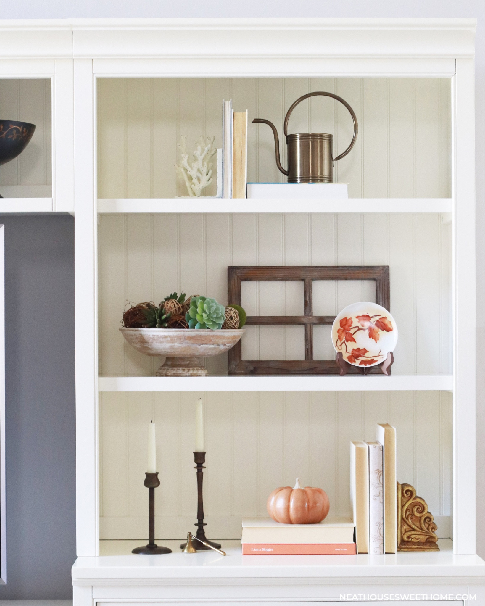 Inexpensive fall decor for bookshelf.

#LTKSeasonal #LTKstyletip #LTKhome