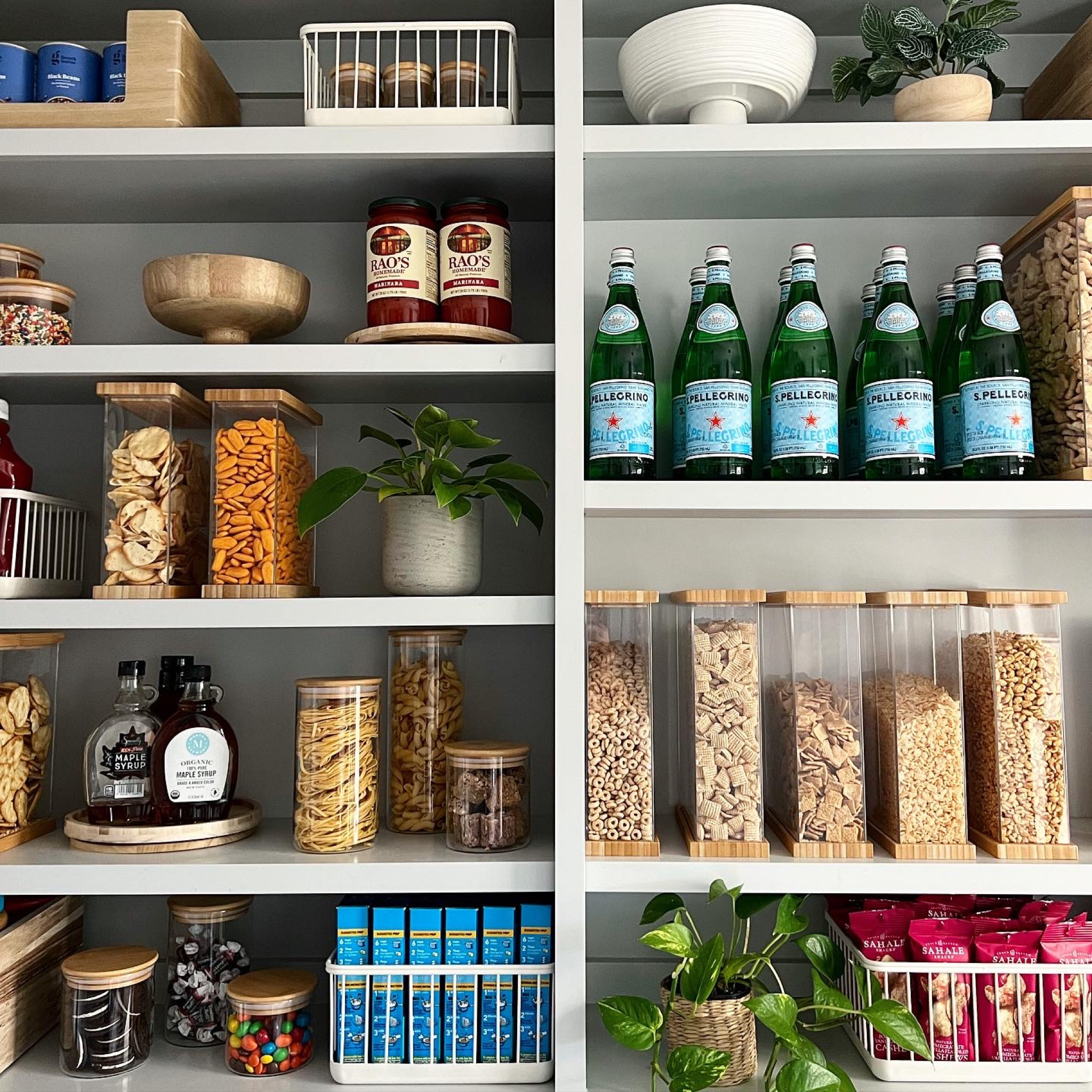  I’ve fallen in love with a lot of pantries…this one might be my new favorite. Isn’t she gorgeous? 

💬 Let’s chat products!

• A mix of natural wooden, acrylic + bamboo & metal baskets provide open storage while adding extra polish to the pantry. I love how they add warmth and visual interest to this open shelving. 

🪴 While I love the gorgeous products, the plants are my favorite addition. Edible? No. But the natural light in here is so good, they’re going to thrive. Pantries can often be an after thought, but why not give them a little special design treatment when you’re in and out of there everyday? I’m passionate about making your home feel like a special retreat and this pantry accomplishes just that. Who wouldn’t want to stuff Oreos in their face while staring at this space, right? 

🖤 An organized, functional system is ALWAYS my goal. However, creating spaces that reflect both the style and personality of the home and the client is so important.

#LTKunder50 #LTKfamily #LTKhome