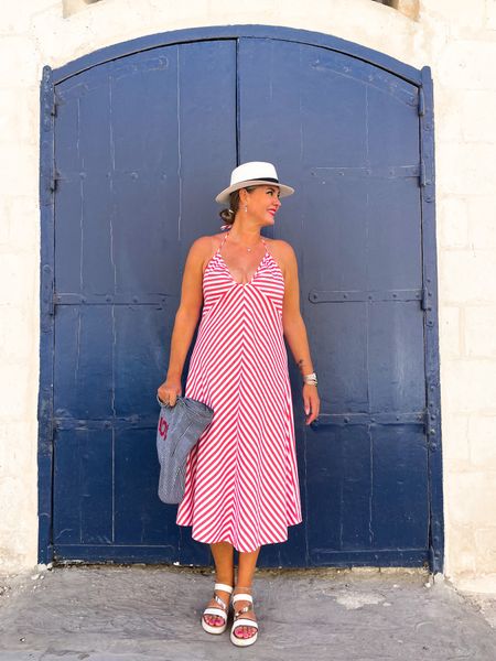 Outfits of the week. A red and white striped halter midi dress with sun hat and white sandals. 



#LTKeurope #LTKtravel #LTKmidsize