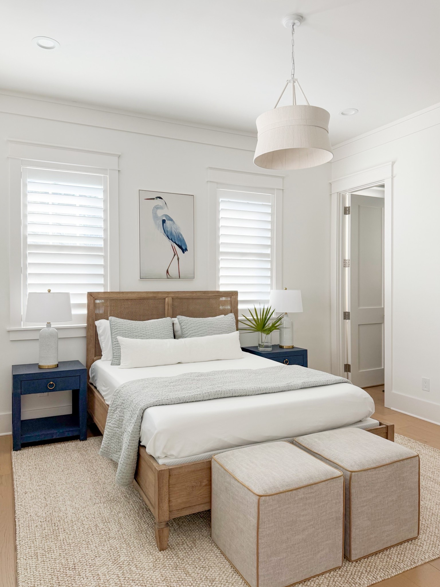 A quick guest bedroom refresh to prep our home for listing! This coastal bedroom mixes a wood and bed, neutral rug, navy blue nightstands, rope chandelier and our favorite Quince bedding! #ltkhome #ltkseasonal #ltksalealert

#LTKHome #LTKSeasonal #LTKSaleAlert