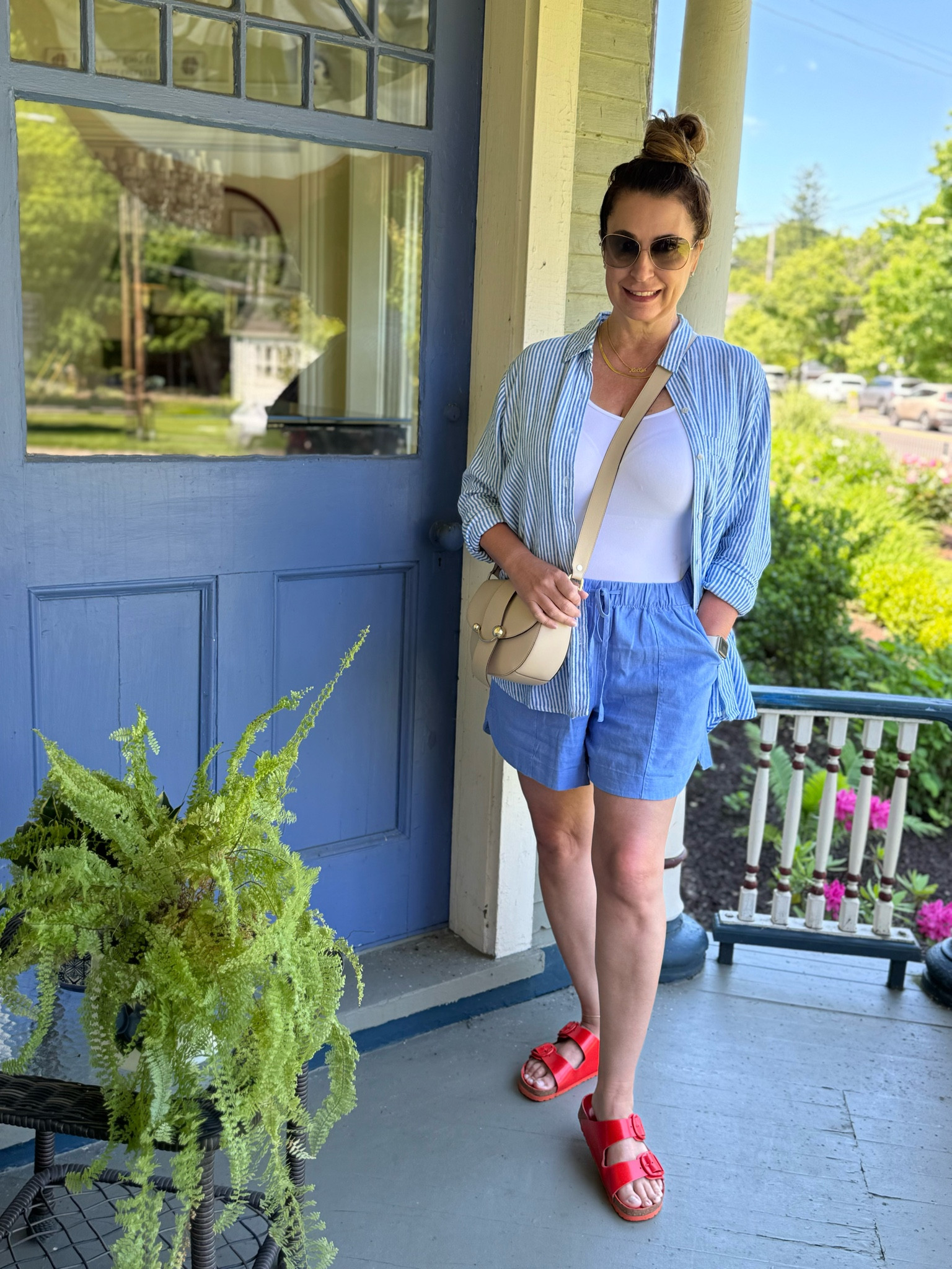 🇺🇸 The perfect low key 4th of July outfit! 🇺🇸
I haven’t worn shorts in years but these are so flattering that I bought 3 pairs! Paired with a striped shirt and tank, it’s the perfect summer outfit. And a pop of red is always a good idea! 
Shorts - large
Shirt - large 

#LTKFindsUnder50 #LTKSummerSales #LTKMidsize