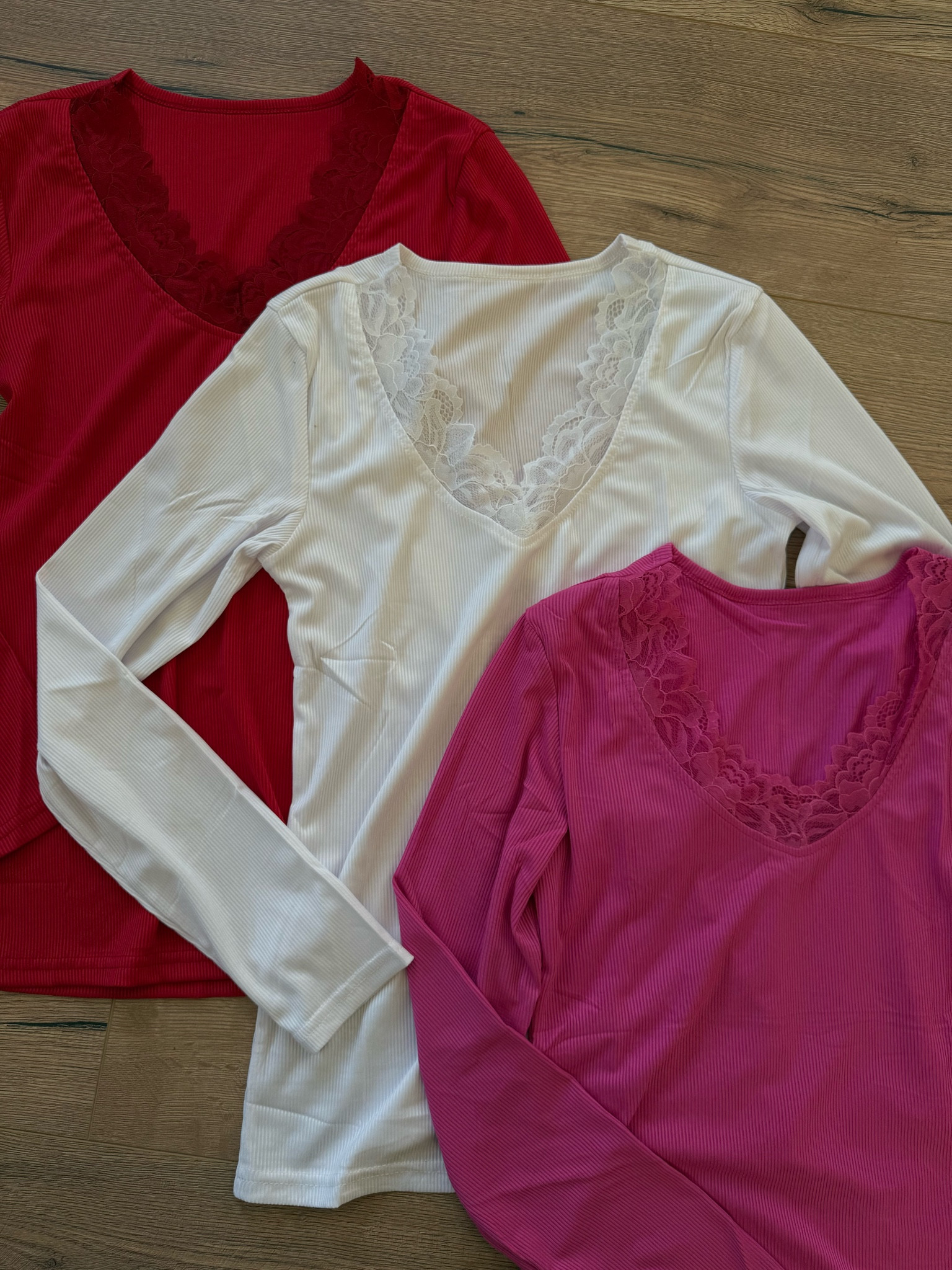 Cutie v neck tops! I would order my TTS! 