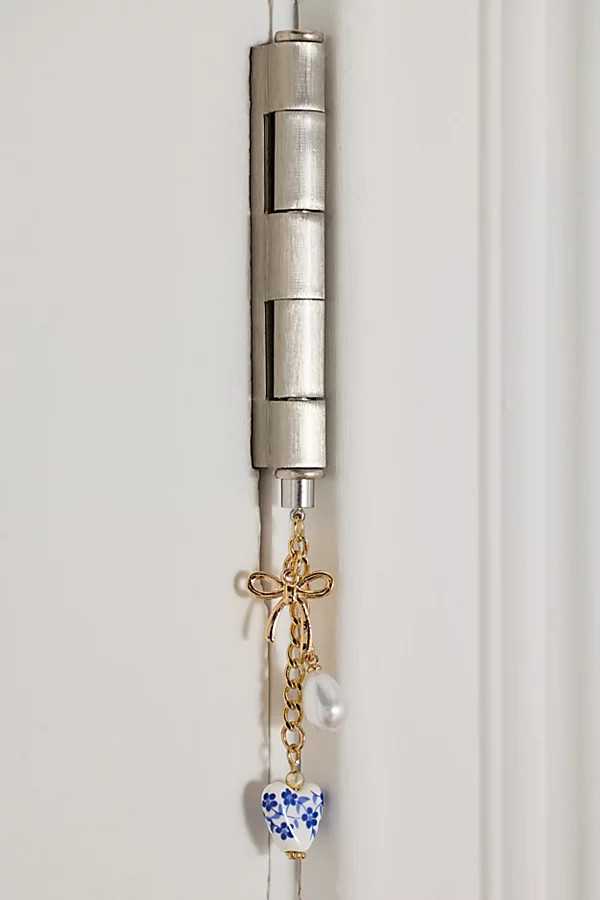 Charm Dangle Door Hinge Magnet in White at Urban Outfitters | Urban Outfitters (US and RoW)