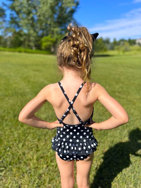 Here's what the back of my daughter's black & white polka dot one-piece swimsuit looks like, now on sale with code MAGGIE15! 
#fashiondeal #kidsswimwear #toddlerclothes #summerfashion

#LTKSwim #LTKSaleAlert #LTKKids