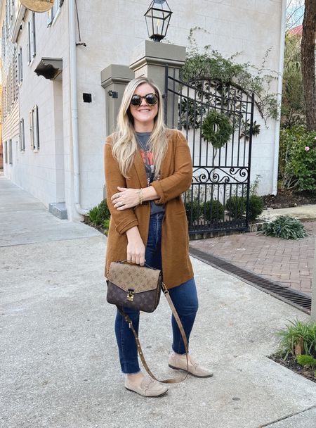Fall travel outfit. 

Vintage tee // camel coat // suede loafers // frayed hem jeans // sunglasses // necklace 

Find more outfit inspiration at Cristincooper.Com/daily-looks

#LTKSeasonal #LTKstyletip