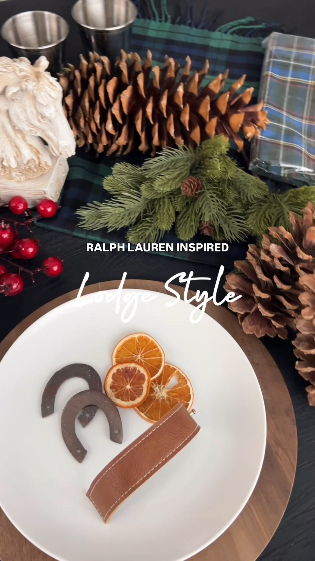 Ralph. Lauren Lodge inspired tablescape. Plaid napkins. Velvet runner. Dried oranges. Leather napkin holders. Wood chargers. Horseshoe decor equestrian decor. Sugar pine cones. Christmas berries.

#LTKHome #LTKHoliday